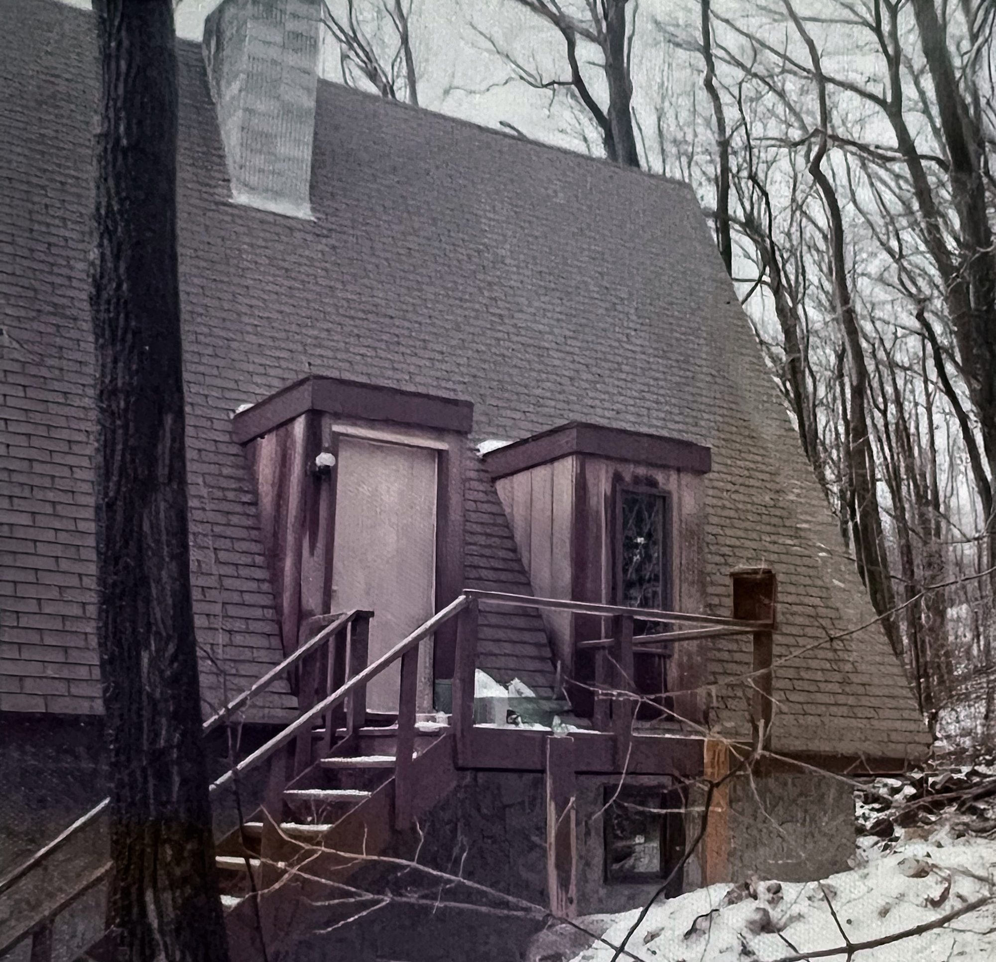 Vintage photograph of the finished A-frame in winter
