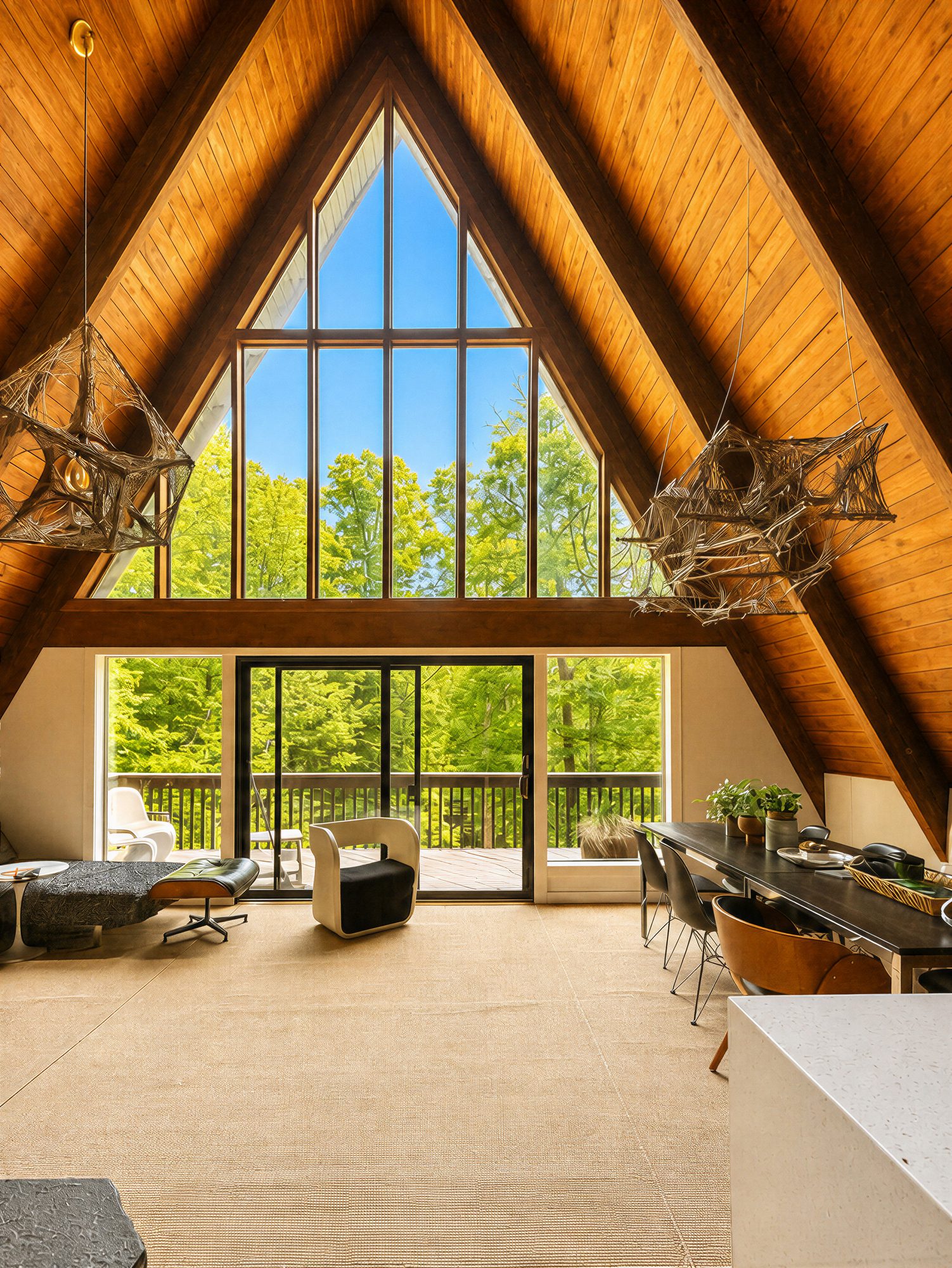 Looking up at the A-frame window wall from the living room
